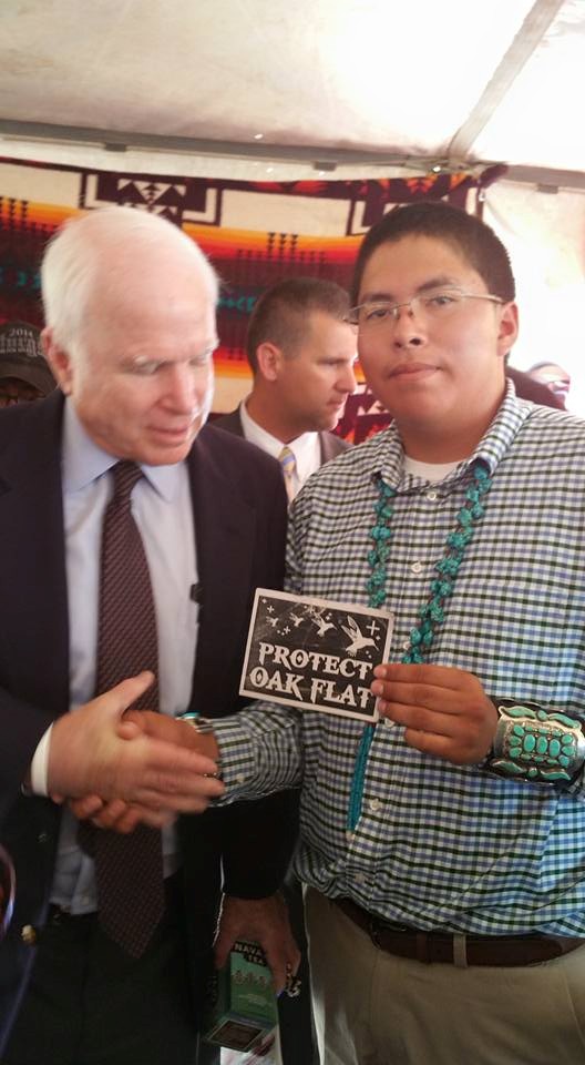 Adriano Tsinigine Dine Navajo Youth serves papers to Senator McCain August 14, 2015